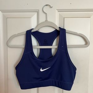 Purple sports bra.